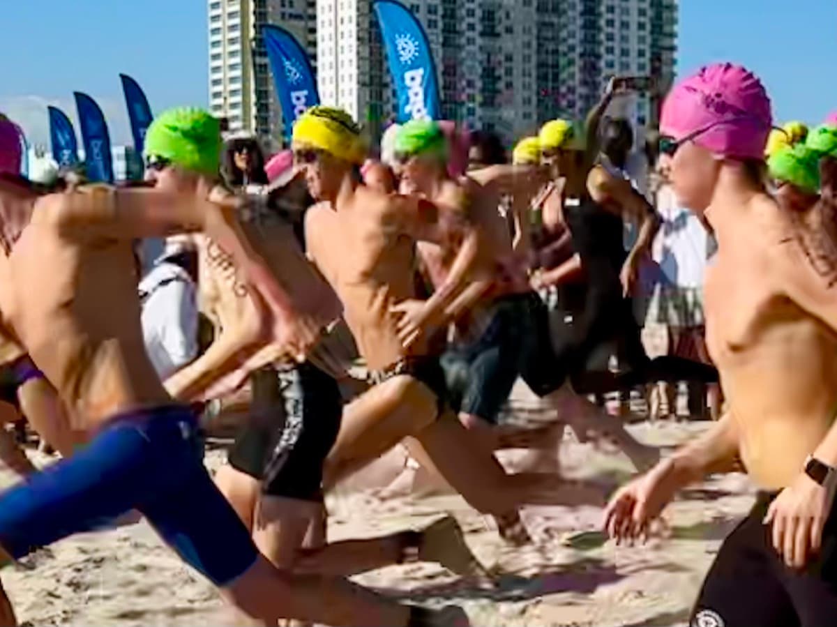 Safety kayak monitoring the course